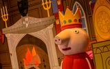 Peppa Pig wears a crown on her head