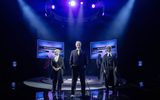 The cast of quiz standing on the stage.