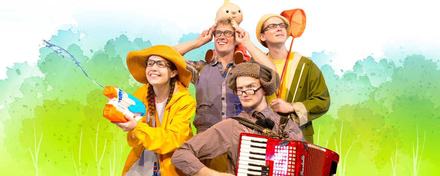 Four people wearing glasses hold objects like a water gun, a net and an accordion