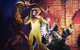 The cast dressed as animals dancing on the stage.