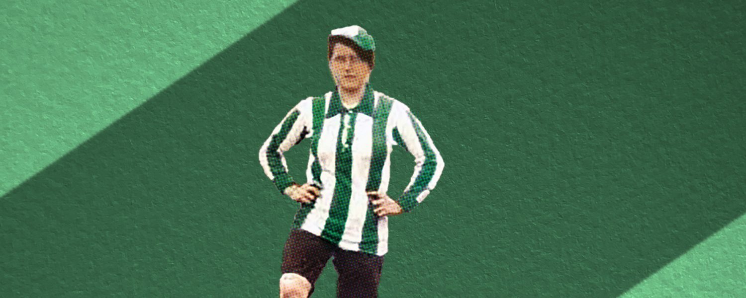 A person in a green and white striped football tshirt