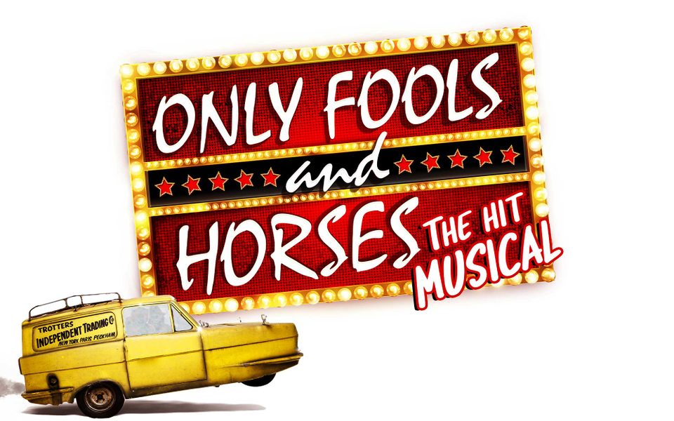 A sign saying 'Only Fools and Horses The Hit Musical' with s yellow car.