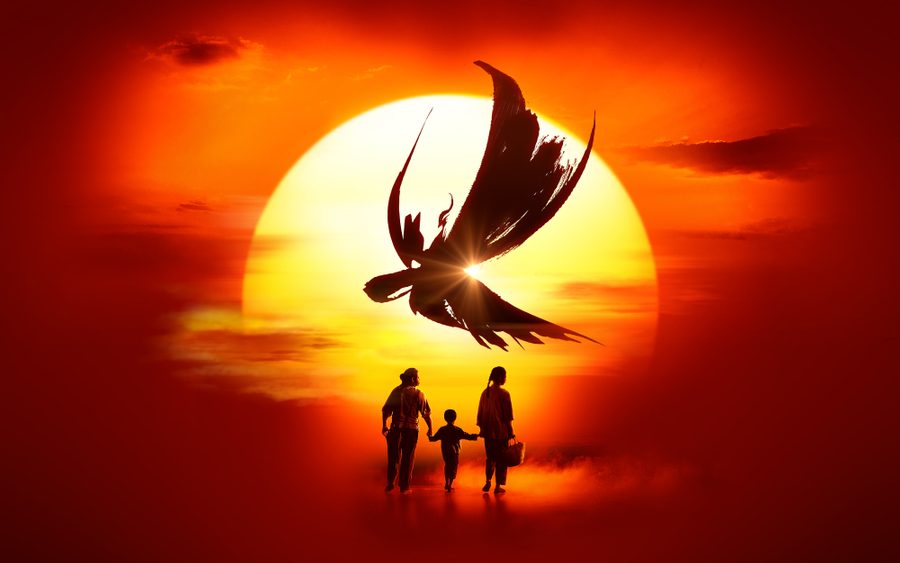 Miss Saigon A man, woman and child hold hands as they walk into a sunset