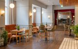 The decor is luxurious and opulent - with theatrical elements such as the red drapes and the chain curtain suspended from the ceiling.